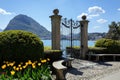 Old gate in Park Ciani at the lake Lugano on a sunny spring day. Town of Lugano, Switzerland Royalty Free Stock Photo