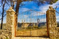 Old gate and Ronda town in distance, Spain Royalty Free Stock Photo