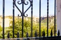 Old gate and Ronda town in distance, Spain Royalty Free Stock Photo