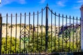 Old gate and Ronda town in distance, Spain Royalty Free Stock Photo