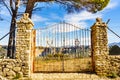 Old gate and Ronda town in distance, Spain Royalty Free Stock Photo