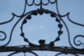 Old gate with texture and moon with clear sky in background