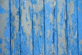 wooden vertical boards with cracked old blue paint for background Royalty Free Stock Photo