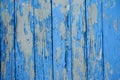 wooden vertical boards with cracked old blue paint for background Royalty Free Stock Photo