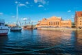 Old Gdansk waterfront with yacht and tourist ship