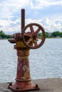 Old gear and rusted cogwheel mechanism, cog gear wheel for water