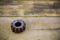 Old gears of the machine on wooden background Royalty Free Stock Photo