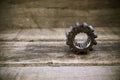 Old gears of the machine on wooden background. The gears on vintage picture style Royalty Free Stock Photo