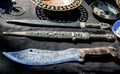 Old Georgian daggers and knives are sold at the flea market