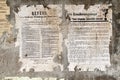 Old german damaged poster newspaper news on a wall