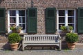 Old German house with windows with wooden shutters Royalty Free Stock Photo