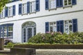 Old German house with windows with wooden shutters, Wachtendonk Royalty Free Stock Photo