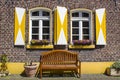 Old German house with windows with wooden shutters Royalty Free Stock Photo