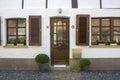 Old German house with wooden door and windows with wooden shutters, Wachtendonk Royalty Free Stock Photo