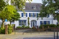 Old German house with wooden door and windows with wooden shutters Royalty Free Stock Photo