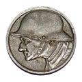 Old german iron coin or token , with soldier in helmet. WW1. Royalty Free Stock Photo