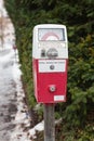 Old German parking meter in winter Royalty Free Stock Photo