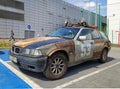 Old German scrap rusty car BMW parked