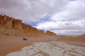 Old german vintage campervan at stone formation Pacana Monks, Monjes De La Pacana, The Indian Stone, near Salar De Tara