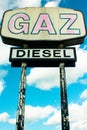 Old giant gas diesel sign by the road Royalty Free Stock Photo