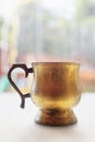 Old gilded copper pitcher Royalty Free Stock Photo
