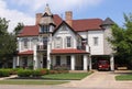 Old Gingerbread Style Mansion Located in Rural South East Texas Royalty Free Stock Photo