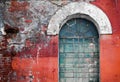 Old glass with an arch and a brick wall Royalty Free Stock Photo