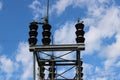 Ceramic Insulators at a neighborhood electrical sub station Royalty Free Stock Photo