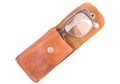 Old glasses in a leather case, isolated Royalty Free Stock Photo