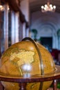 Old globe on bookshelf background with Selective focus and Retro style Science. Royalty Free Stock Photo