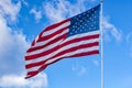Old Glory Against a Blue Sky and Clouds - 2 Royalty Free Stock Photo