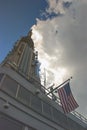 Old Glory flying near the top of the Empire State Building in New York Royalty Free Stock Photo