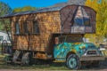 An Old GMC Truck with a home made camper on the back in the countryside of Utah Royalty Free Stock Photo