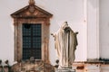 Old Goa, India. Cathedral Of St. Paul And Statue Of Jesus In Sunny Day Royalty Free Stock Photo