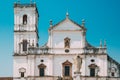 Old Goa, India. Cathedral Of St. Paul And Statue Of Jesus In Sunny Day Royalty Free Stock Photo