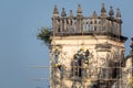 Indian labourers working on the repair and restoration of the ancient Portuguese era Church and