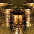 Old Gold Coins in Stacks and Piles for Cash Money Representing Wealth and Riches Royalty Free Stock Photo