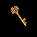 Old gold key isolated on black background with clipping path Royalty Free Stock Photo