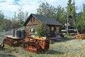 Old Gold Mining Equipment left at outside the abandonned Con Mine in Yellowknife, Northwest Territories Royalty Free Stock Photo