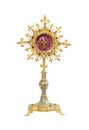 Old gold monstrance with cross inside on white background Royalty Free Stock Photo