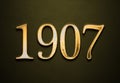 Old gold effect of 1907 number with 3D glossy style Mockup. Royalty Free Stock Photo