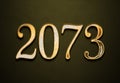 Old gold effect of 2073 number with 3D glossy style Mockup. Royalty Free Stock Photo