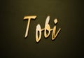 Old gold text effect of name Tobi with 3D glossy style Mockup. Royalty Free Stock Photo