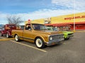 1old golden 1972 Chevrolet Chevy C10 Brava pickup truck in a parking lot. Classic car show. Royalty Free Stock Photo