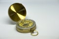 An old golden compass on a white background Royalty Free Stock Photo
