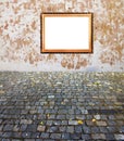 Old golden frame wall and pavement Royalty Free Stock Photo