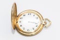 Old golden pocket watch manufactured in switzerland colored golden Royalty Free Stock Photo