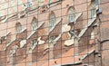 Old gothic cathedral reflection in a modern corporate office building glass windows. Old vs new, different generations, the past Royalty Free Stock Photo