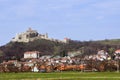 Old gothic stronghold overwatching village