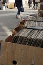 Old gramophone records and books put on sale on street Royalty Free Stock Photo